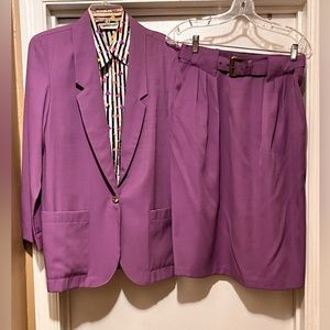 Women’s two piece skirt suit with shirt.